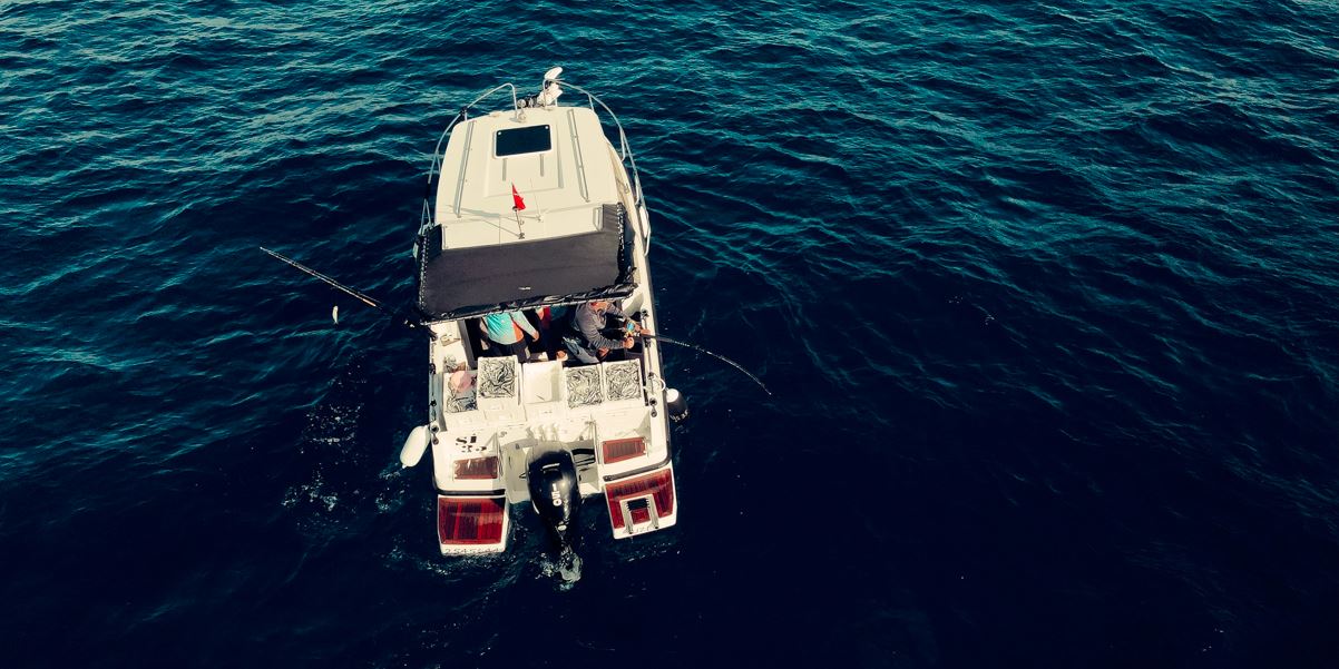 Tulum fishing charter; people fishing on a yacht