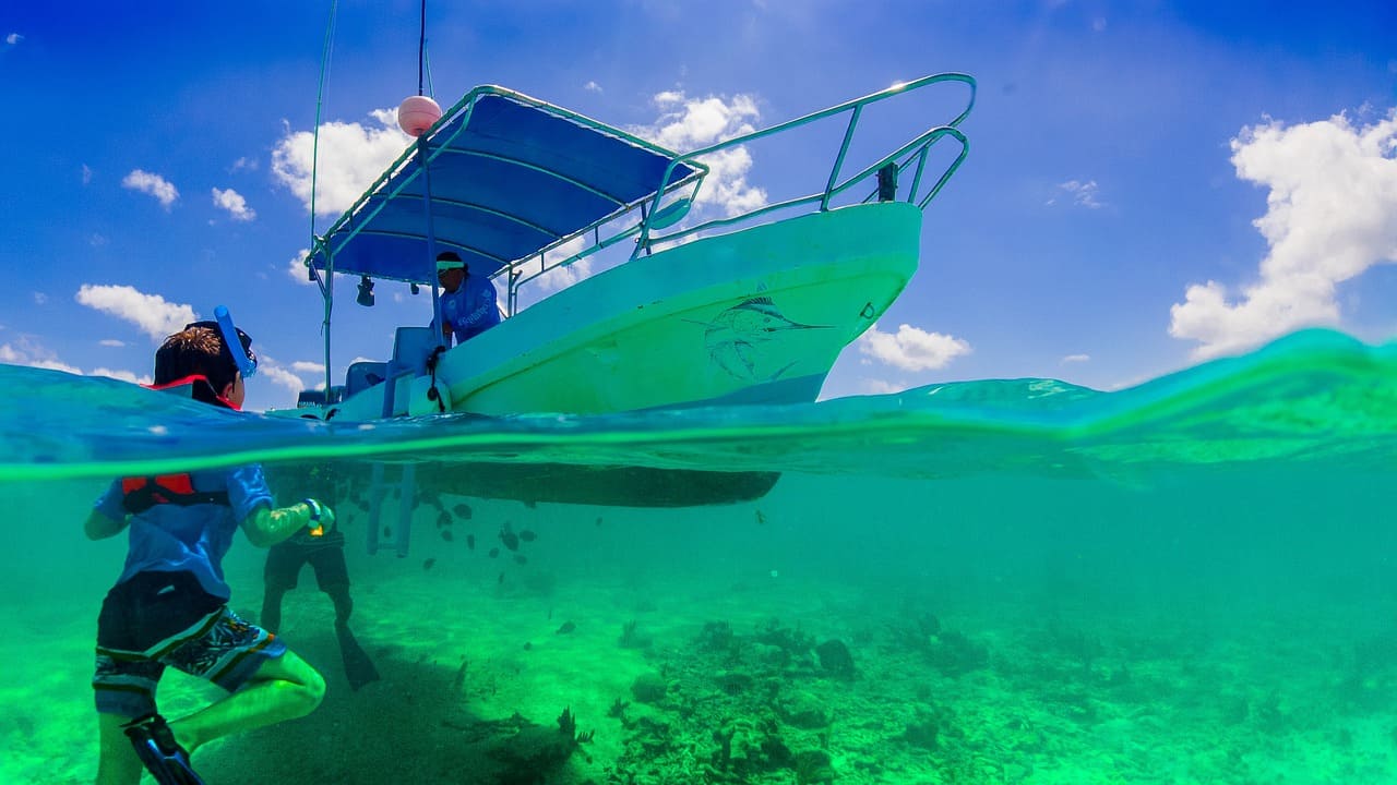 Tulum yachts; kid swimming in Tulum