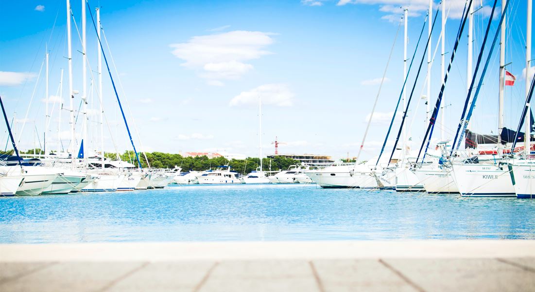 Yacht rentals in Tulum; view from a dock on yachts